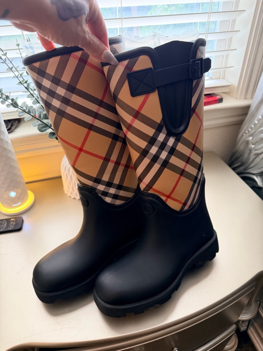 New rain boots plaid pattern , size 8.5